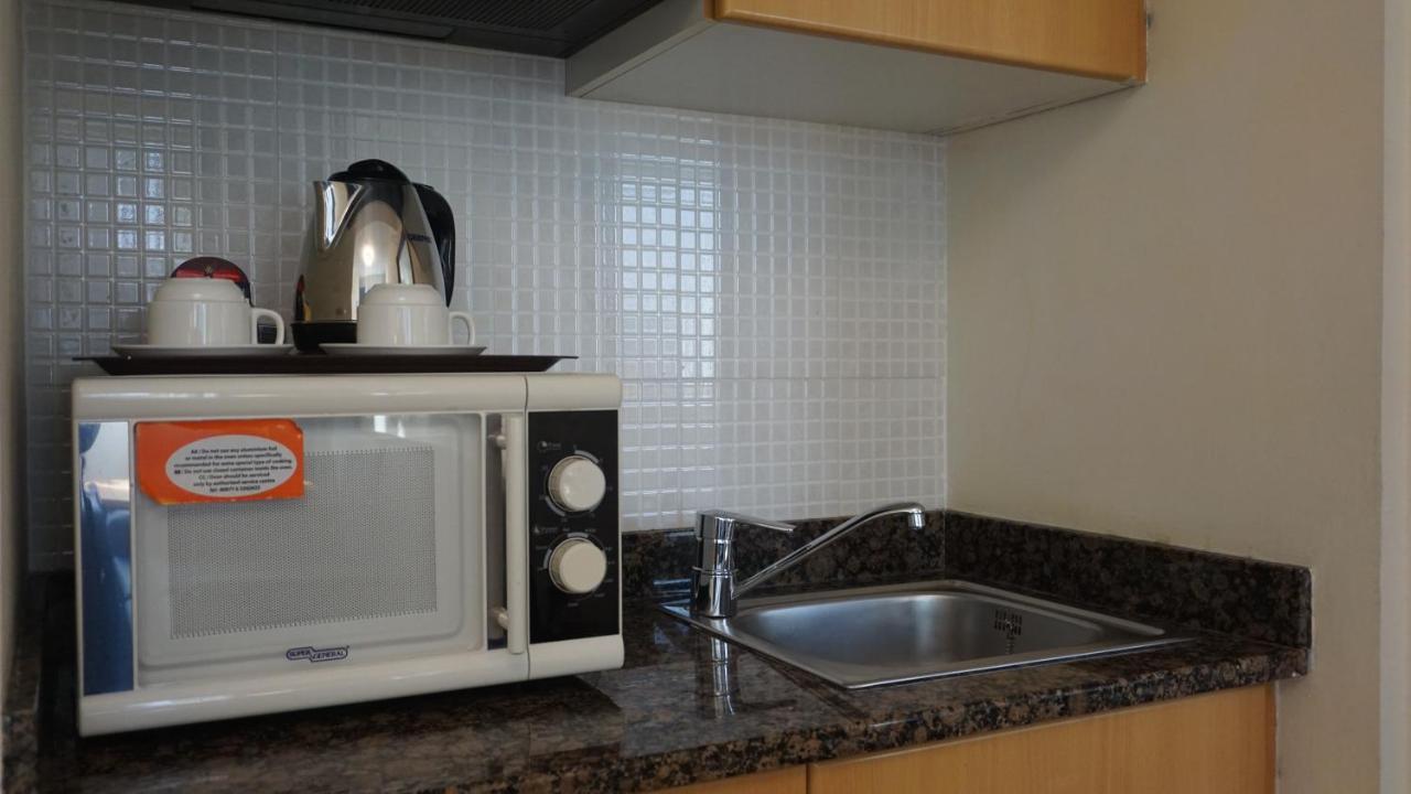 אפרטהוטל Golden Tulip שארג'ה מראה חיצוני תמונה