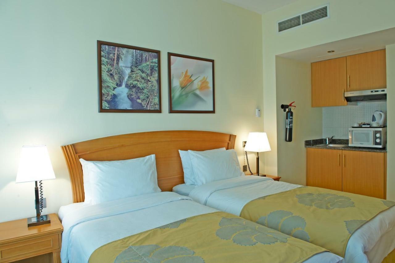 אפרטהוטל Golden Tulip שארג'ה מראה חיצוני תמונה